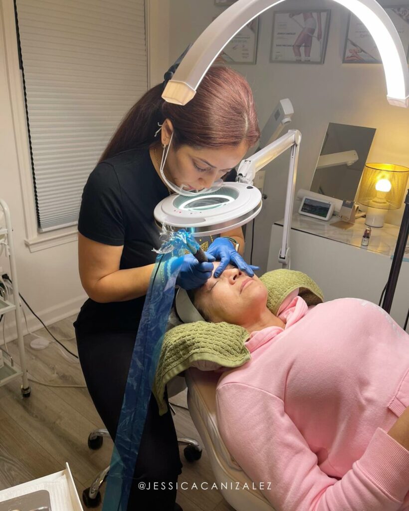 A woman receiving a facial treatment at a Memphis salon.
