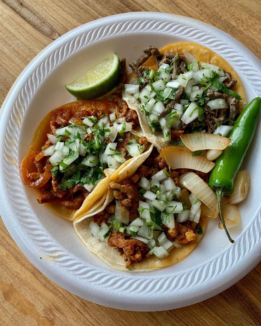 Tacos on a table.
