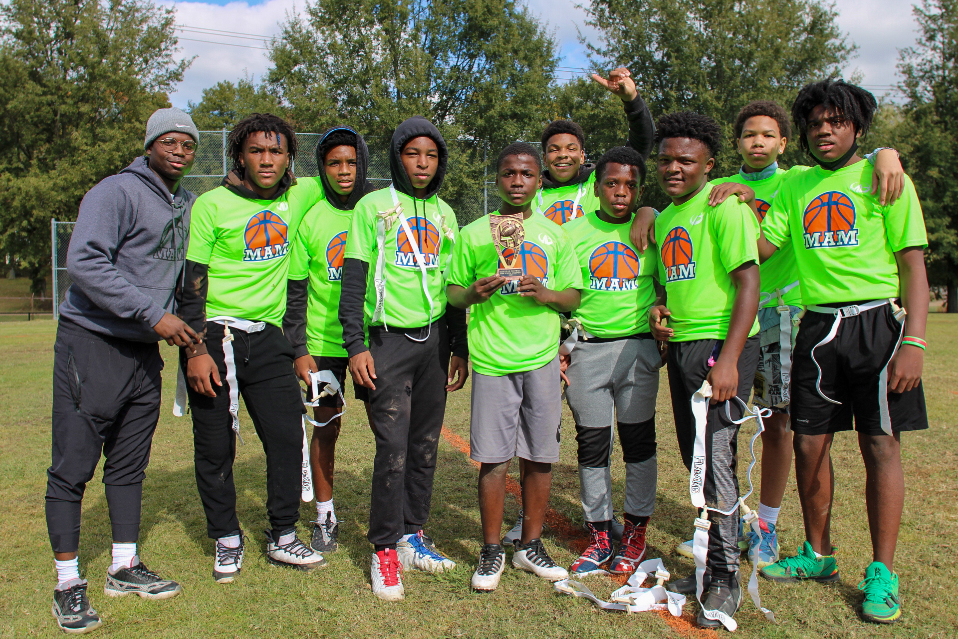 Memphis Athletic Ministries lacrosse players posing for a picture.