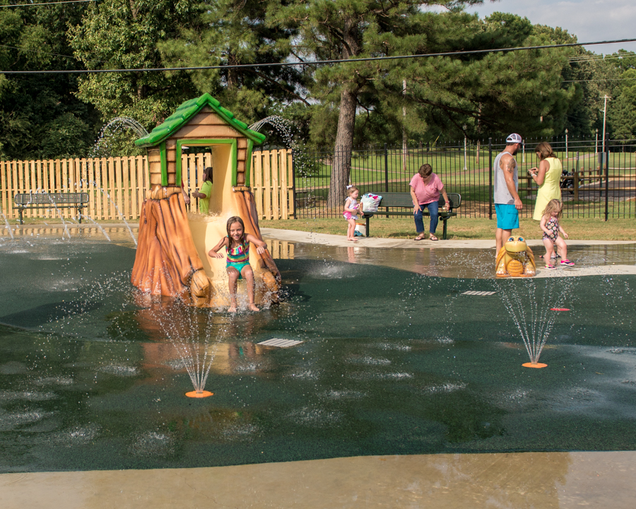Young children and families having fun at Memphis Splash Pad in Barlett, TN.