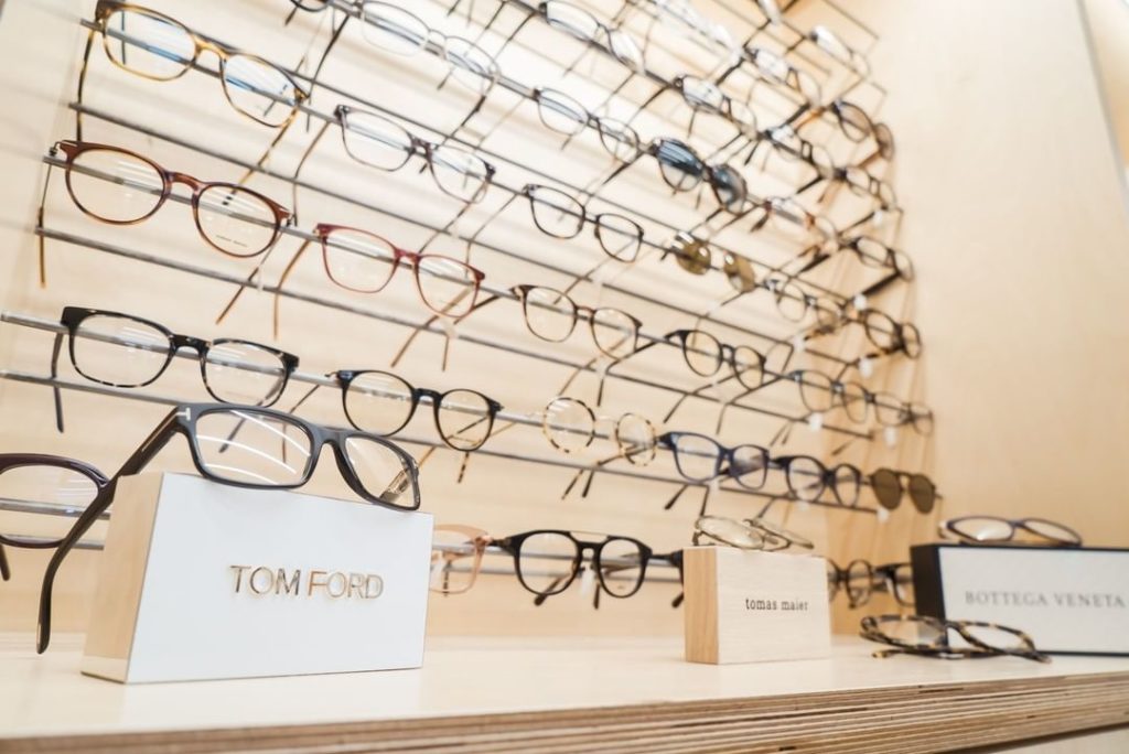 A display of eyeglasses on display in a store.