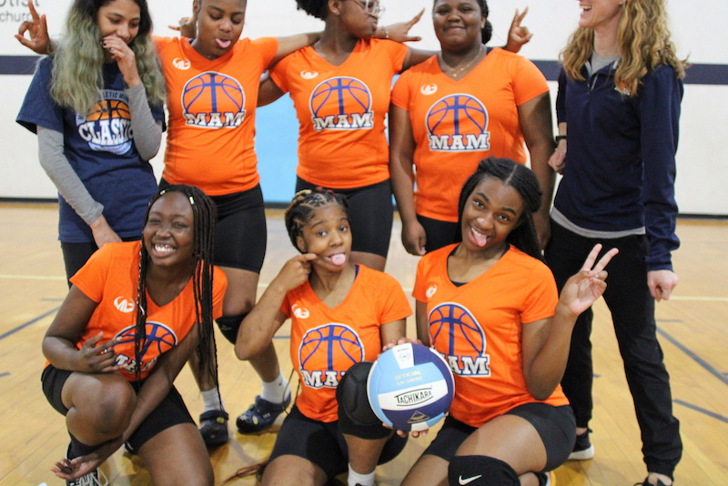 A group of girls from Memphis Athletic Ministries posing for a photo.