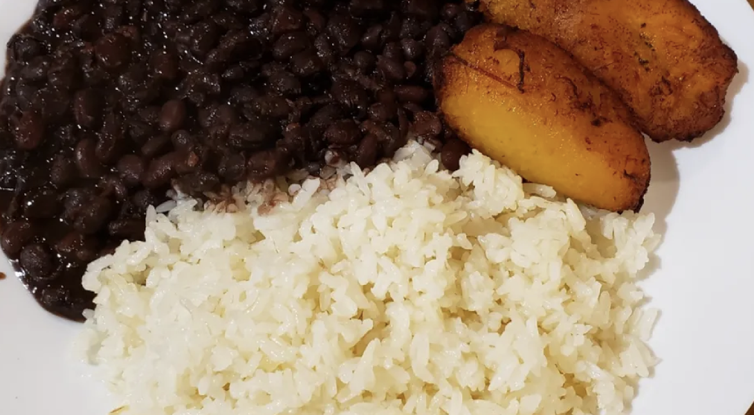 A plate with a healthier alternative of rice and black beans.
