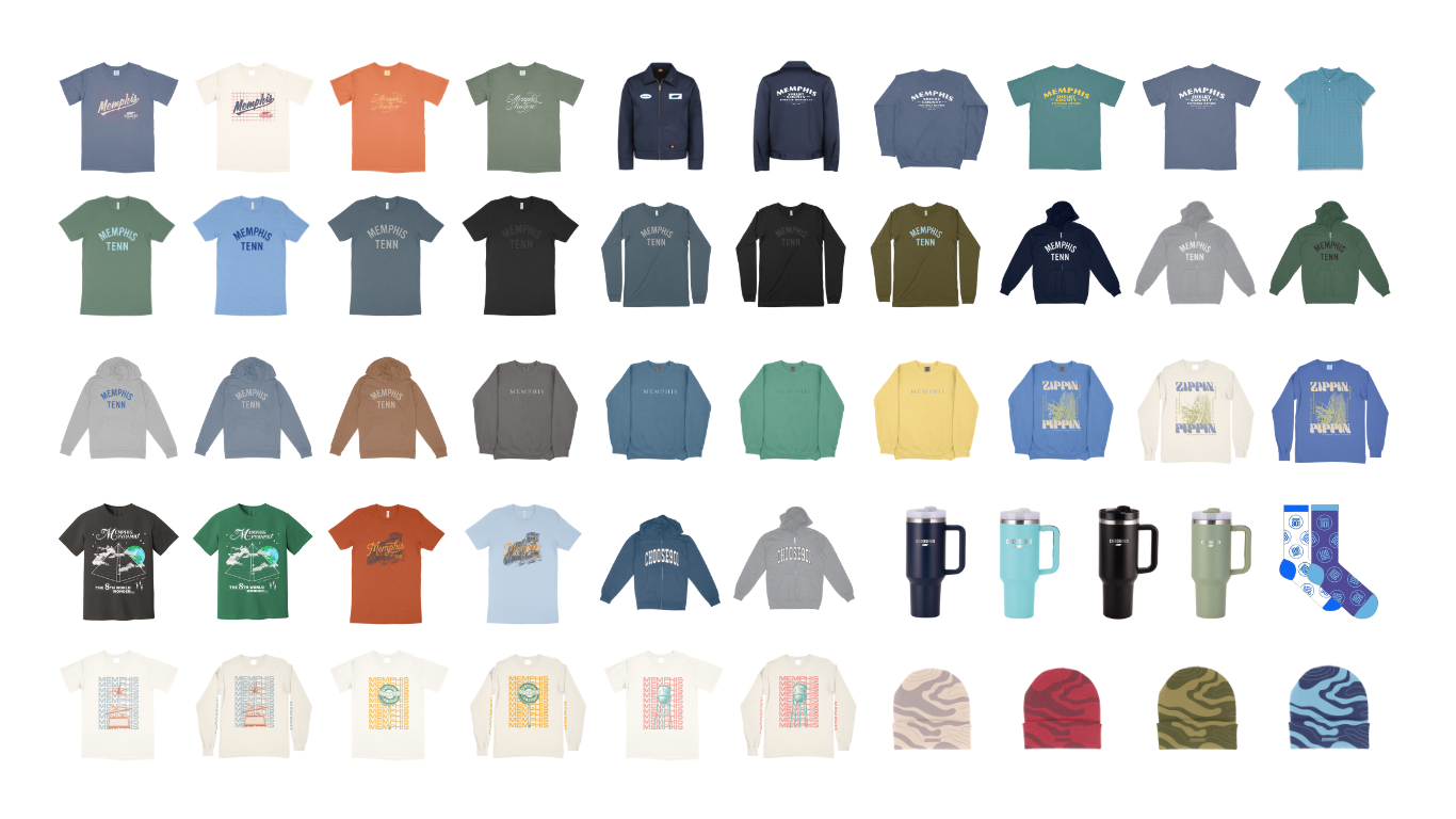 A collection of Choose901 Holiday Market t-shirts, hats, and other items.