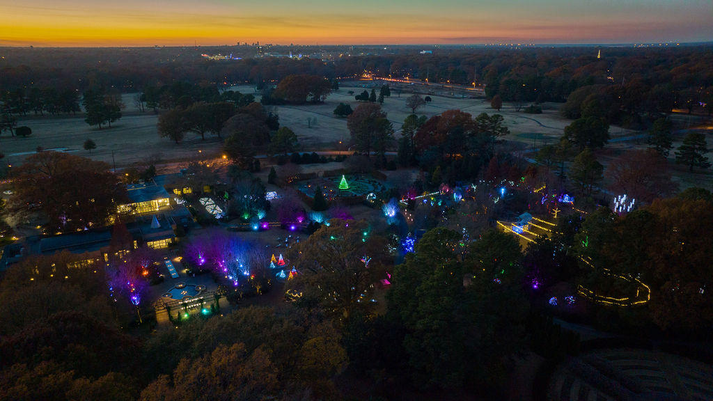 An aerial view of a park with colorful lights at dusk in Memphis.