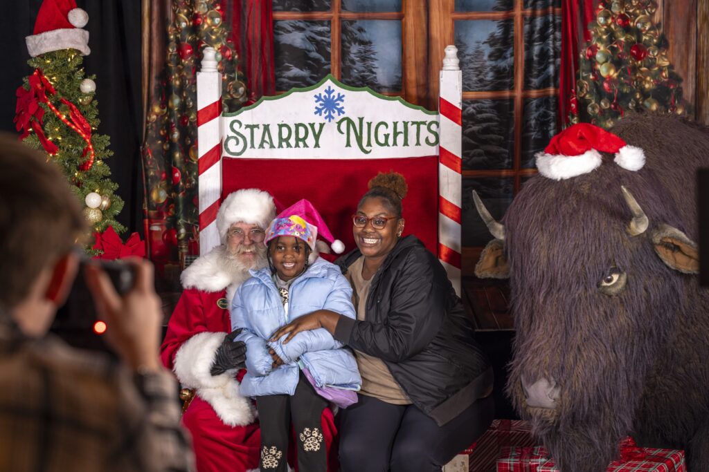 Santa Claus spreads holiday cheer at Starry Nights in Memphis.