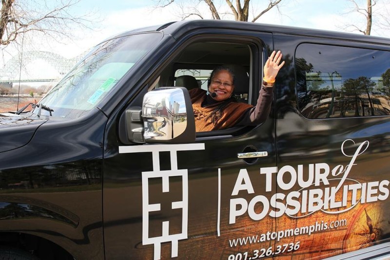 A woman in a van offering tours showcasing Black history in Memphis.