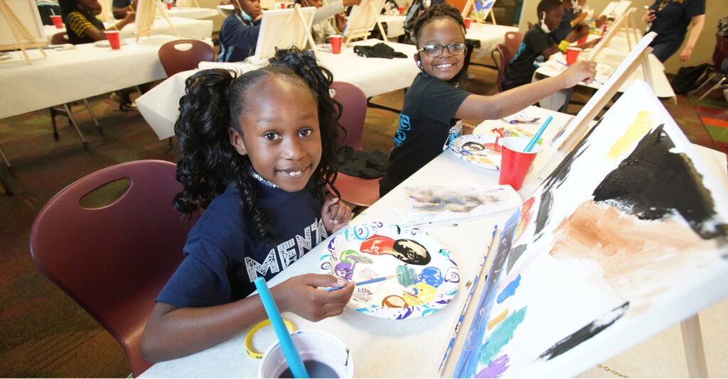 Children participating in a painting class at the Tennessee Mentoring Matters Summit.